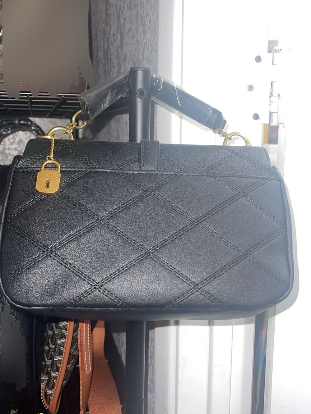 Classic Black Quilted Shoulder Bag with Gold Hardware